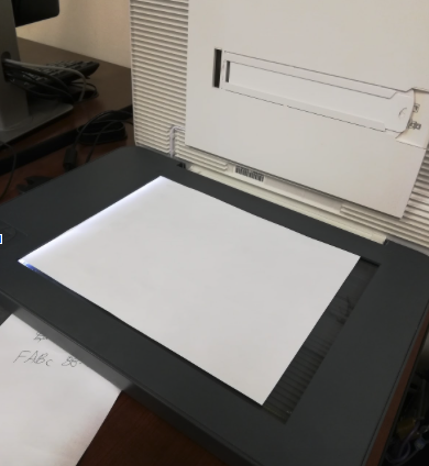 Scanner with paper